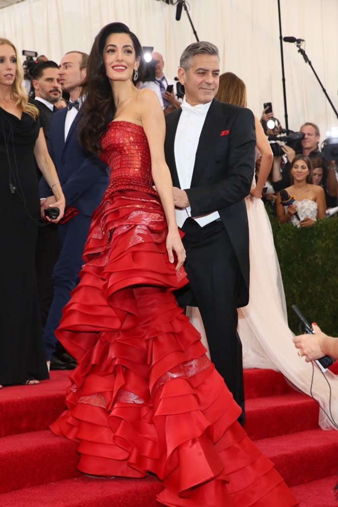 Amal Clooney in Margiela with George Clooney.