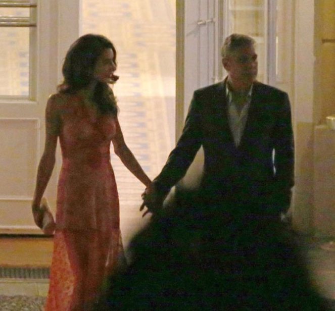 **USA ONLY** London, UK -  Amal Clooney and George Clooney show us that they're still deep in the throes of love as they were spotted  having a romantic dinner at luxury hotel Ville D' Este in Italy.  Amal wore a sexy sheer red gown that showed off her toned legs, and Clooney looked more than happy to show off his beautiful bride as he amped up the PDA.  The two shared moonlight kisses while toasting to their love.     AKM-GSI       August 6, 2015 **USA ONLY**  To License These Photos, Please Contact : Steve Ginsburg (310) 505-8447 (323) 423-9397 steve@akmgsi.com sales@akmgsi.com or Maria Buda (917) 242-1505 mbuda@akmgsi.com ginsburgspalyinc@gmail.com
