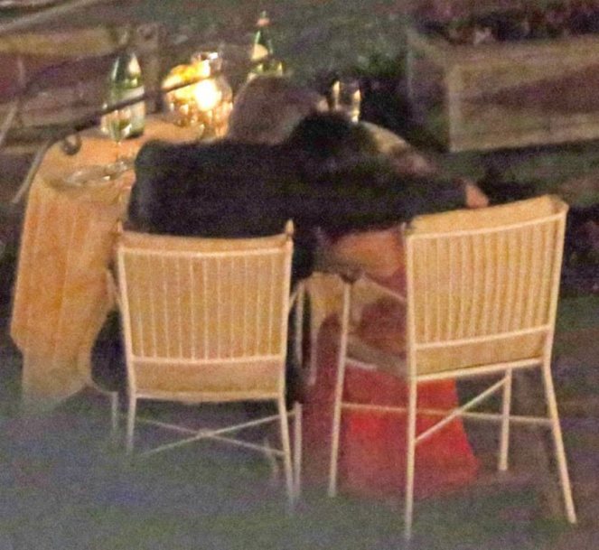 **USA ONLY** London, UK -  Amal Clooney and George Clooney show us that they're still deep in the throes of love as they were spotted  having a romantic dinner at luxury hotel Ville D' Este in Italy.  Amal wore a sexy sheer red gown that showed off her toned legs, and Clooney looked more than happy to show off his beautiful bride as he amped up the PDA.  The two shared moonlight kisses while toasting to their love.     AKM-GSI       August 6, 2015 **USA ONLY**  To License These Photos, Please Contact : Steve Ginsburg (310) 505-8447 (323) 423-9397 steve@akmgsi.com sales@akmgsi.com or Maria Buda (917) 242-1505 mbuda@akmgsi.com ginsburgspalyinc@gmail.com