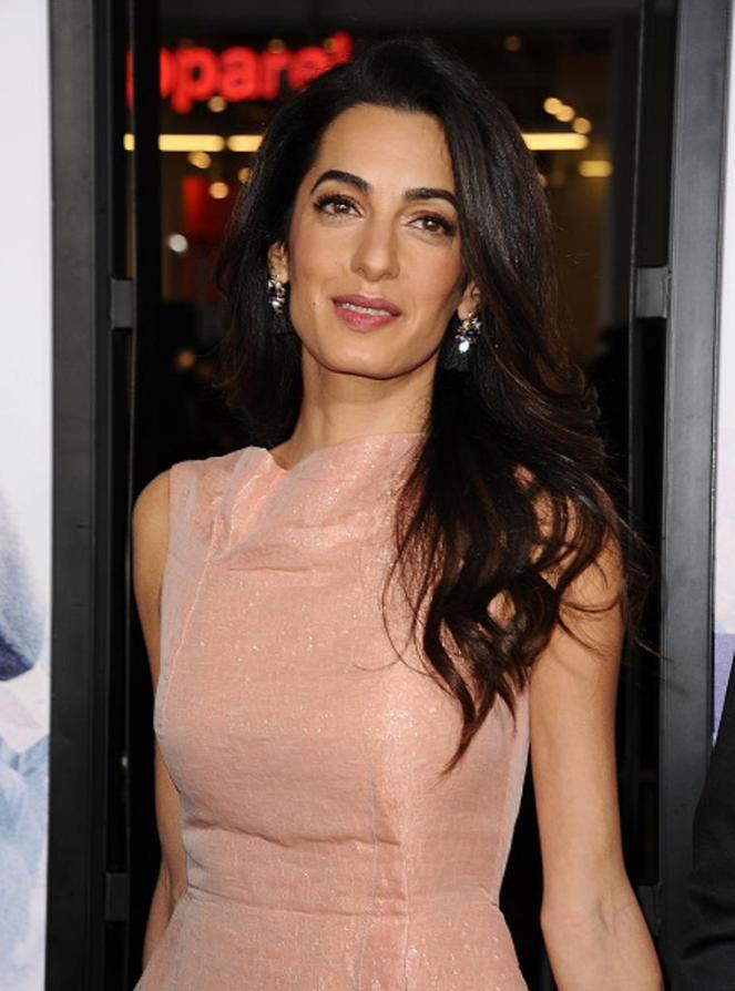 HOLLYWOOD, CA - OCTOBER 26: Amal Clooney attends the premiere of 