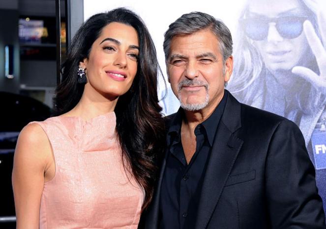 HOLLYWOOD, CA - OCTOBER 26: Lawyer Amal Alamuddin Clooney and actor/producer George Clooney arrive at the Premiere of Warner Bros. Pictures' 'Our Brand Is Crisis' at TCL Chinese Theatre on October 26, 2015 in Hollywood, California. (Photo by Barry King/Getty Images)