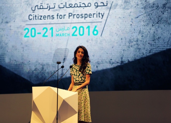 Amal Alamuddin Clooney, writer, human rights activist, talks during the opening ceremony of the International Government Communications Forum in Sharjah, United Arab Emirates, Sunday, March 20, 2016. (AP Photo/Kamran Jebreili)